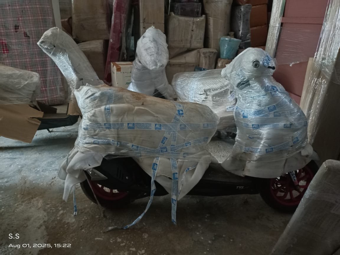 Two-wheelers wrapped in protective packing inside the warehouse
